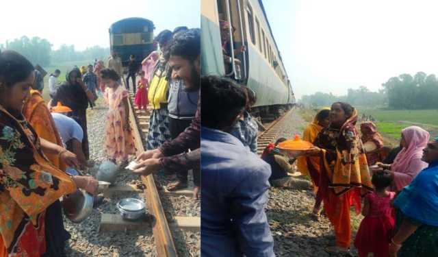 পথে বিকল ট্রেন, যাত্রীদের খাওয়ালেন গ্রামবাসী